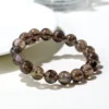 Auracharming Bracelet Right Side Ruby-Gold Flash