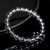 Auracharming Clear Quartz Bracelet Performing Light Dance on Black Tray