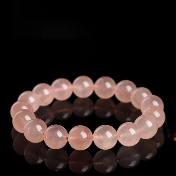 Auracharming Grapefruit Pink Quartz Bracelet Flat Lay Showing Creamy Texture