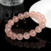 Auracharming Grapefruit Rose Quartz Bracelet Left Side Lighting Showing Creamy Texture