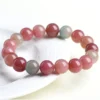 Auracharming Milkshake Tourmaline Jade Bracelet on White Plate