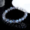 Overhead view of Auracharming Moonstone Bracelet in a seashell bowl