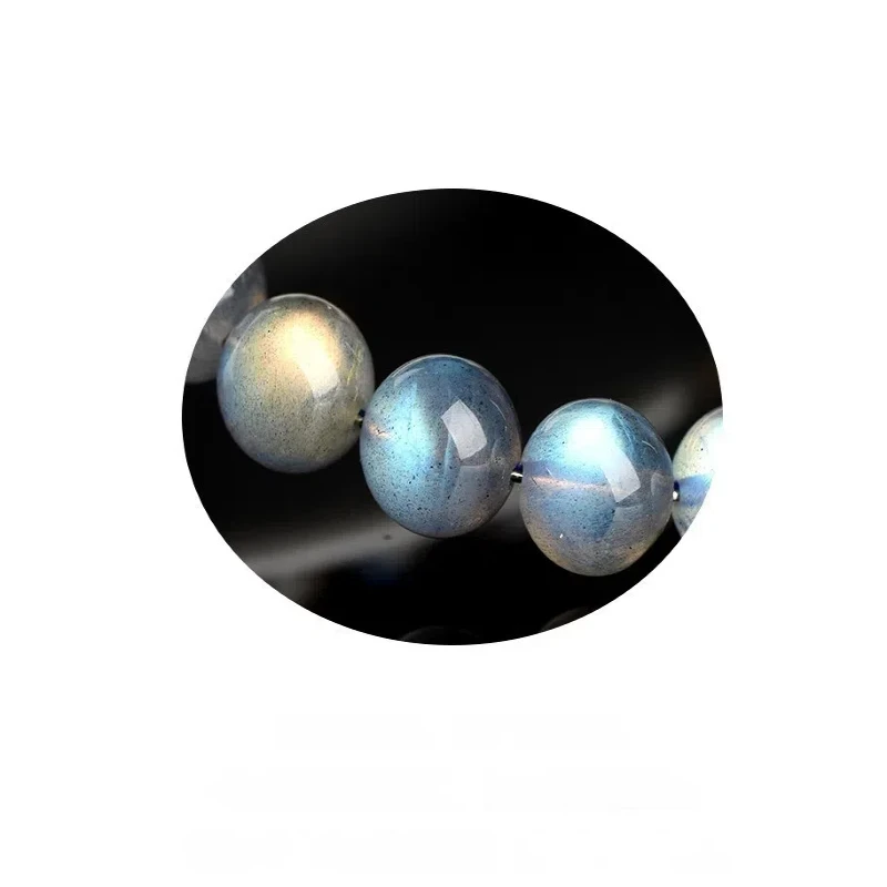 Dynamic lighting on Auracharming Gray Moonstone Bracelet in bowl