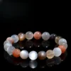 Flat lay of Auracharming Multi-Color Moonstone Bracelet