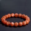 Auracharming Golden Sand Orange Moonstone Bead Bracelet Flat Lay