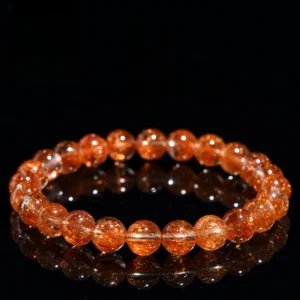 Auracharming Red Copper Rutile Bracelet Flat Lay
