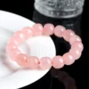 Auracharming Rose Quartz Barrel Bracelet on White Tray Showing Creamy Texture