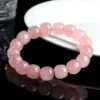Auracharming Rose Quartz Bracelet Left Side Lighting Showing Greasy Luster