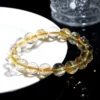 Side-lit Auracharming Titanium Quartz Bracelet in a bowl