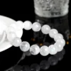 Auracharming White Phantom Money Bowl Bracelet on Wooden Tray, Translucent Beads with Snowscape Patterns