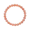Auracharming Orange Strawberry Quartz Bracelet in Sunlight