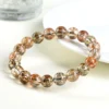 Auracharming Natural Black Gold Super Seven Bracelet – Left Side Angle, Highlighting Gold & Black Rutile