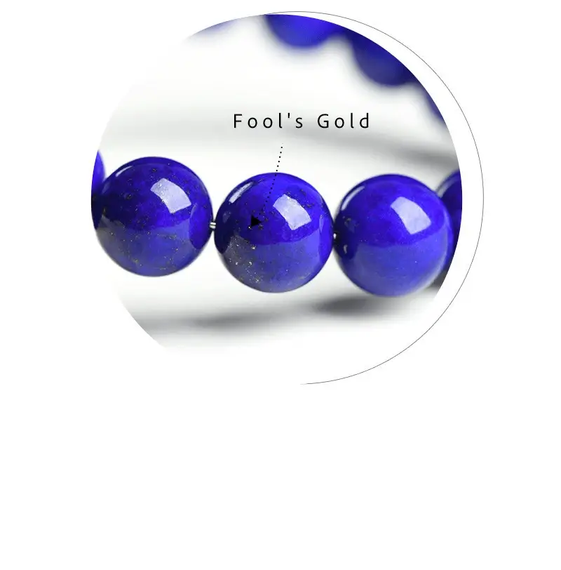 Macro shot of Lapis Lazuli beads showing Pyrite inclusions and color variation.